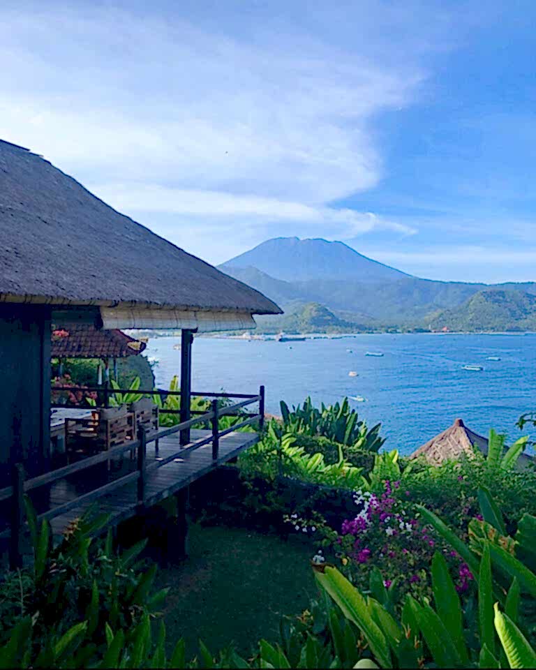 view of villa against ocean and sky